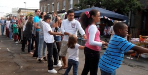 Edithna Street residents getting together for a game of tug-of-war as part of their Big Lunch celebrations