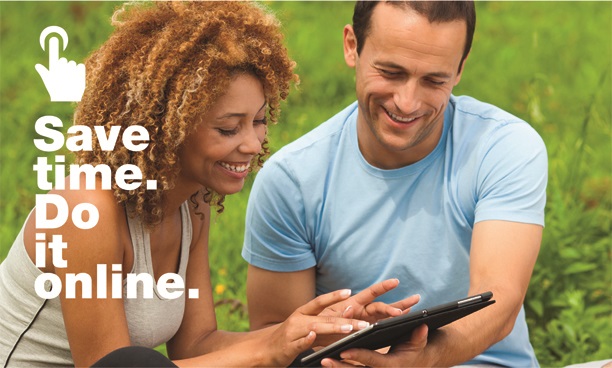 myLambeth poster featuring a couple sitting on some grass with a tablet PC. Caption says "save time, do it online"