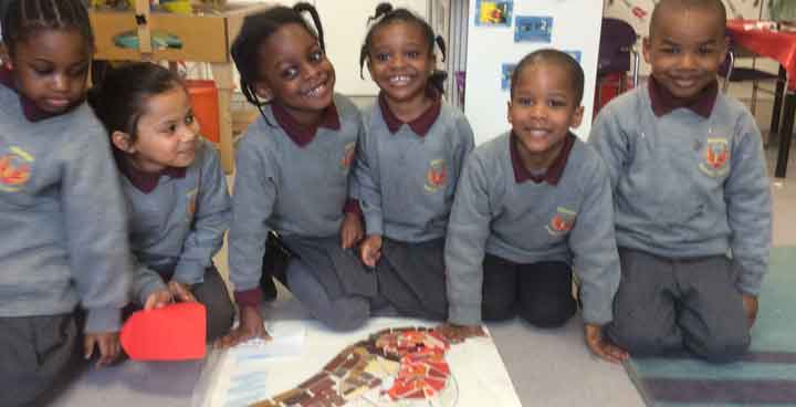 Phoenix Primary School with their bird mosaics