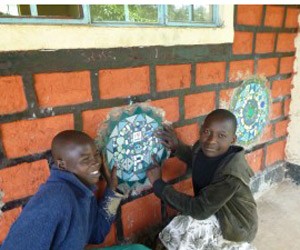 Oogo school children enjoying the mosaics