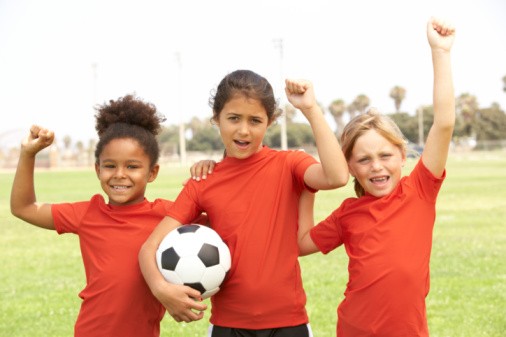 Young Boys And Girls In Football Team