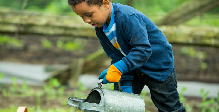 Boy-with-watering-can