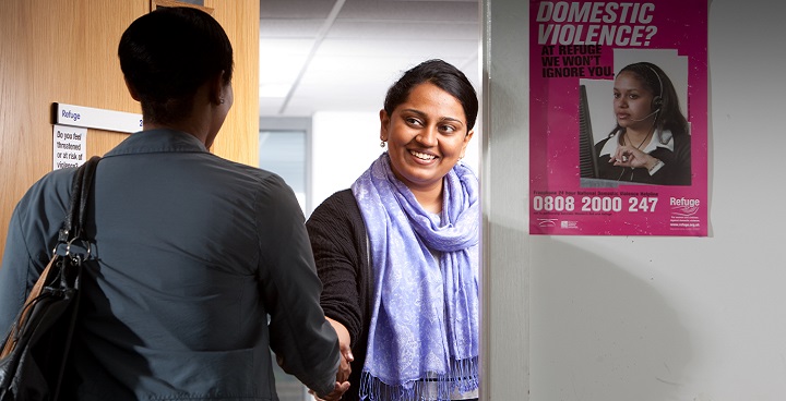 Two women shaking hands at the Gaia centre