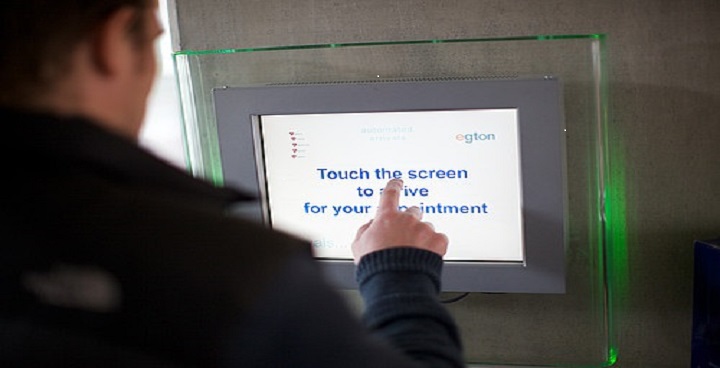 Checking in at GP's appointment touch screen