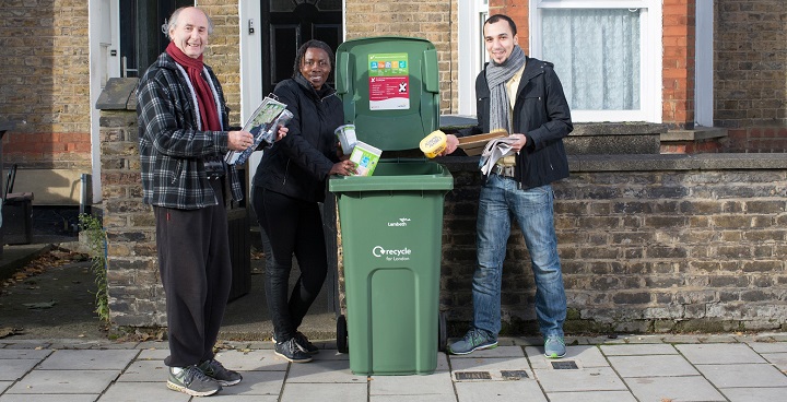 L-R Street Champion Mike Morfey , Cabinet Member for the Environment Cllr Jenny Brathwaite & STreet Champion Monire-El Mudden show how to put mixed recycling in the new green bins without using recycling sacks