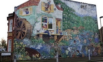 “Big Splash” mural. Intricate mural from the 1980s painted on the side of a house off a side street by Acre Lane. Inspired by the subterranean River Effra that flows beneath Brixton, pays homage to the talented women who worked in the Doulton pottery factory in Lambeth, and features some of the children who were living in that part of Brixton when it was painted.