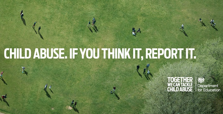 Birdseye view of grassy field with people walking in to. Caption reads: "Child abuse, If you think it, report it."