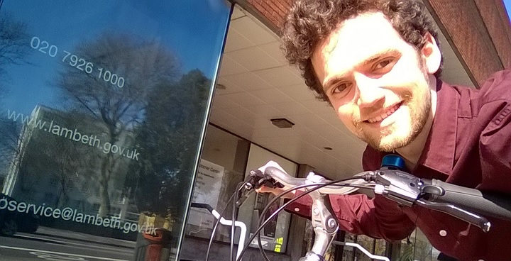 Paul Tait, a graduate trainee for Lambeth, with his bike outside Olive Morris House.