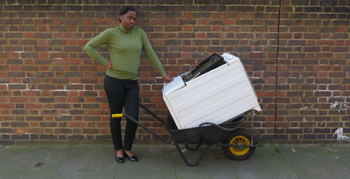 Cllr Jennifer Brathwaite with a dumped kitchen appliance