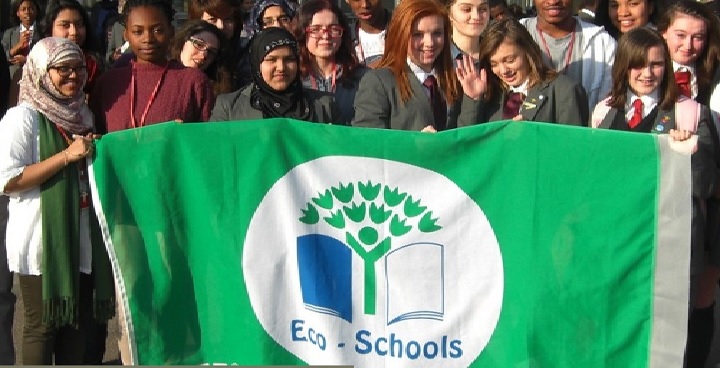 Green school students proudly fly their eco flag