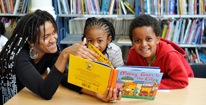 Children reading books at one of our local libraries