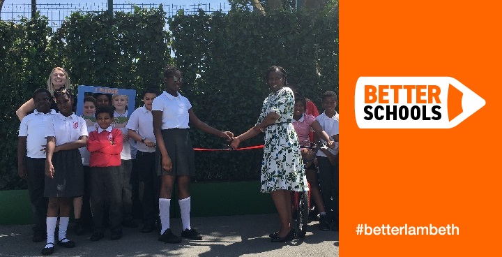 Cllr Brathwaite with teachers and pupils on the playground at St Helen's school for the opening of the green screen