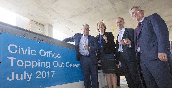 The final steel beam of Lambeth Council’s new Civic Centre with Cllr Paul McGlone who is Lambeth Council’s Deputy Leader, Cllr Lib Peck who is the leader of Lambeth Council, Richard Dobson, London area director for Morgan Sindall and Andrew Boyle, Muse Project Director, South