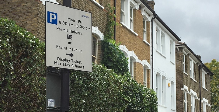 Parking permits sign in a street