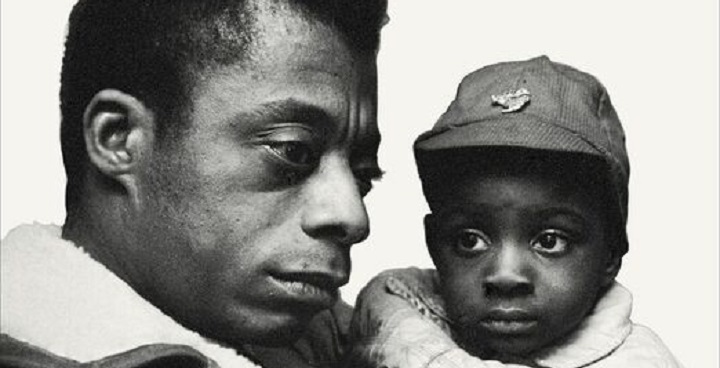 Faces of father and son black and white photo from the cover of Penguin Modern Classic edition of James Baldwin 'the Fire Next Time'