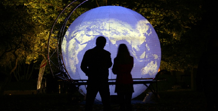 A four-metre high inflated sphere lit with intense translucent colours, projected video images, animations and visual effects that spin magically around the outside of the globe