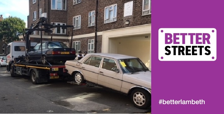 Off-white Mercedes being lifted onto 6-vehicle car transporter as part of action day to remove untaxed cars from Tulse Hill Estate in partnership with Met Police