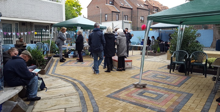 Councillors and residents admire the new block paving at the garden party to launch Weir Estate's new look, 2017