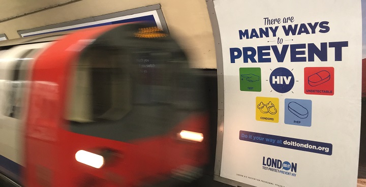 An image taken on the London underground with a tube train in the foreground and a 'do it your way' campaign poster behind