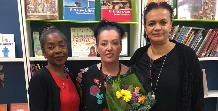 L-R Cllr. Sonia Winifred, Tina Fellows (holding flowers) and Abibat Olulode of Bookstart celebrate Tina's 'Rhymetime' award for work in getting young readers started