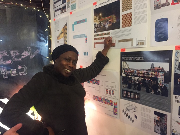 Cllr Jenny Brathwaite checking out the designs in the Brixton Pound Cafe