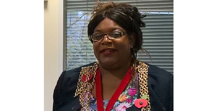 Mayor of Lambeth Cllr Marcia Cameron - head & shoulders pic with chains of office floral dress & Poppy Day Poppy