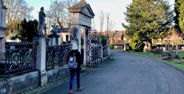 Person walking through West Norwood Cemetery
