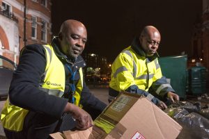 Environmental enforcement Officers examining dumped rubbish