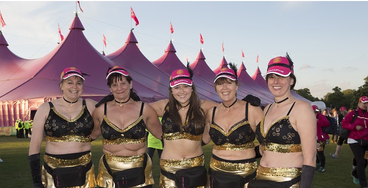 London, UK. 16th May 2015. Participants with illuminated bras at the Walk  the Walk, Moonwalk charity marathon 2015, London, England, raising funds to  help beat breast cancer by walking a marathon around