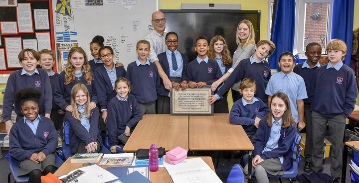 Learning from history: Memorial from St Saviour's Church used in history lesson at St Saviour's school - year 6 class and teachers