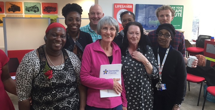 Denmentia Friends training session for Community Connectors with Cllr Meldrum front centre in pink short with glasses & grey hair