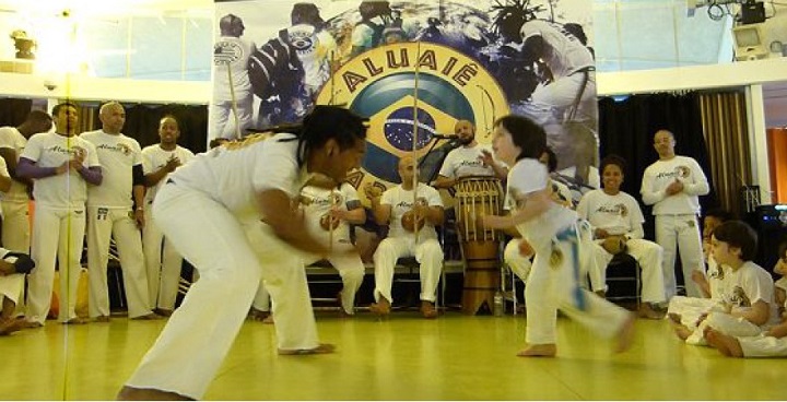 Adult and child in white martial arts clothing as part of the programme for Afro-Brazilian Exchange - one of 9 community organisations in Waterloo to benefit from London Eye funding