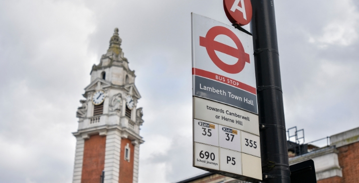 Lambeth Town Hall, with a bus stop sign in the foreground.