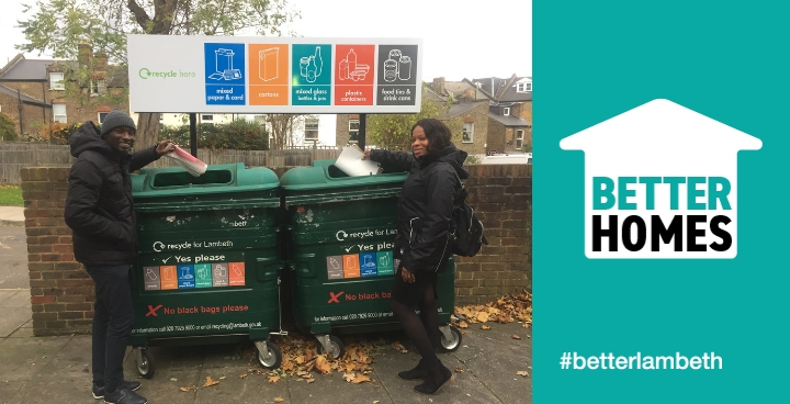 Two of our area housing officers promoting recycling by recycling some waste in bins on an estate.