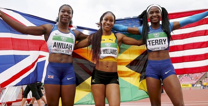 3 runners in kit hold up Union Jack - Kristal Awuah, Lambeth athlete with funding support from GLL, and 2 fell-athletes, raising awareness of the 'Gifted & Talented' funding programme