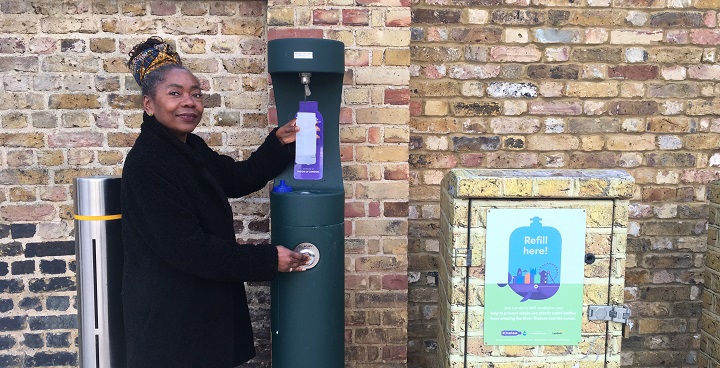 Cllr Winifred refills water bottle at new hydration point installed by Mayor of London & London zoo to reduce plastic waste in Lambeth