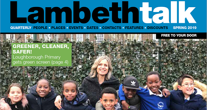 Pupils at Loughborough Primary School pose in front of the new 'green screen' installed.