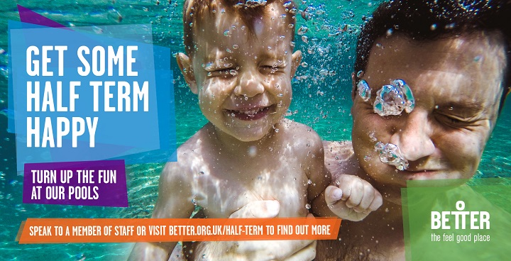 toddler and dad swimming (underwater photo with bubbles against the glass) for half term spring 2019 kids leisure centre programme