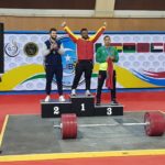 Lambeth resident Forrester Osei takes the winner's Podium as the 2019 African weightlifting champion