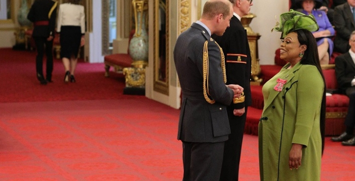 Dedicated foster carer receives MBE at Buckingham Palace