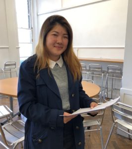 Year 11 student collects her gcse exam results