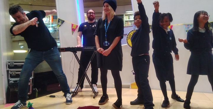 Radio 1 DJ Greg James & keyboard plater, 'evil teacher' Miss Wiley & Clapham Manor pupils help launcvh World Book Day 2020