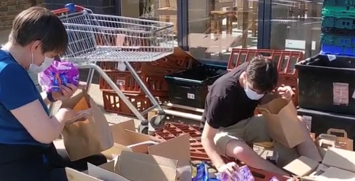 volunteers packing care packages for Black Prince Hub