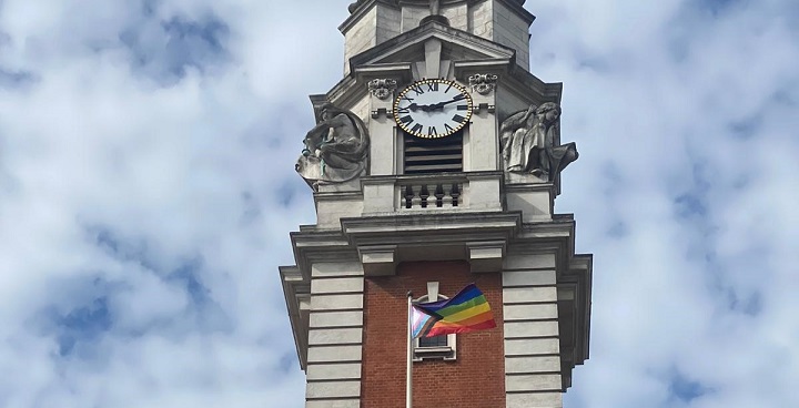 progress flag flies at the town hall