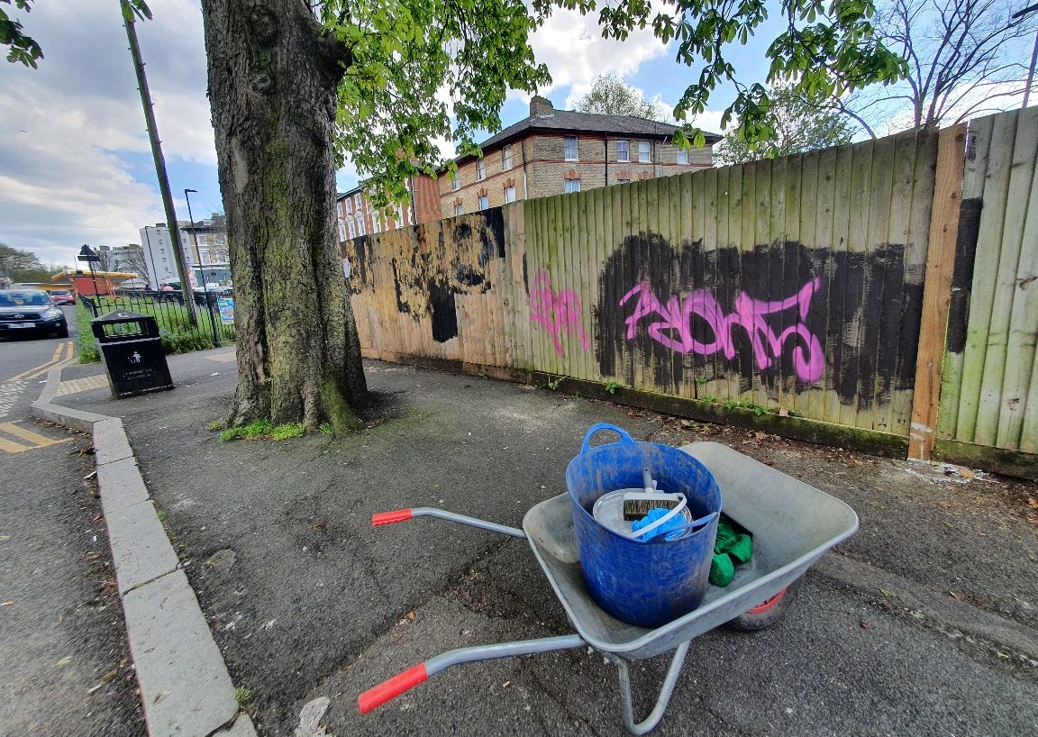 Repaired fence outside Gipsy Hill station with graffiti removed