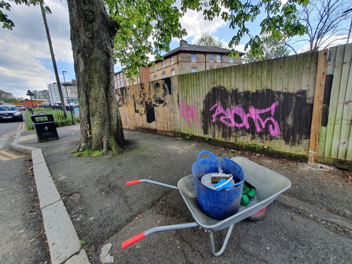 Repaired fence outside Gipsy Hill station with graffiti removed