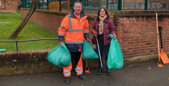 Cllr Rezina with one of our collection crew cleaning up in William Bonney estate