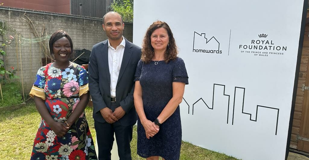 Councillor Claire Holland, Chief Executive Bayo Dosunmu, Councillor Maria Kay stand in front of a white banner with the Homeward logo on it.