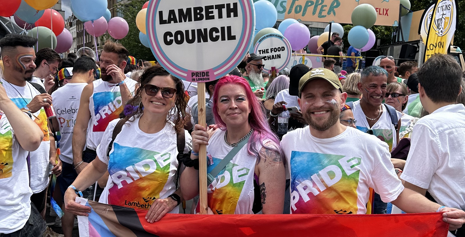 Cllr Holland with co-chairs of the Lambeth LGBTQ+ staff forum in matching ;Pride' T shirts