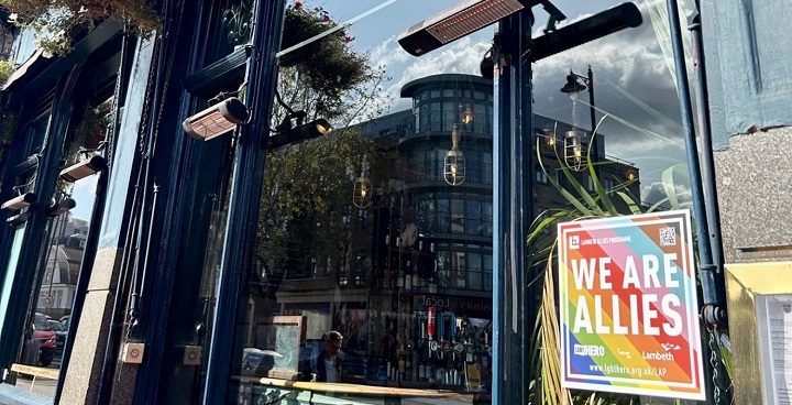 The Railway Tavern, Clapham displays Lambeth Allies window sticker after completing the Lambeth Allies programme programme to create safe LGBTQ+ spaces in Lambeth
